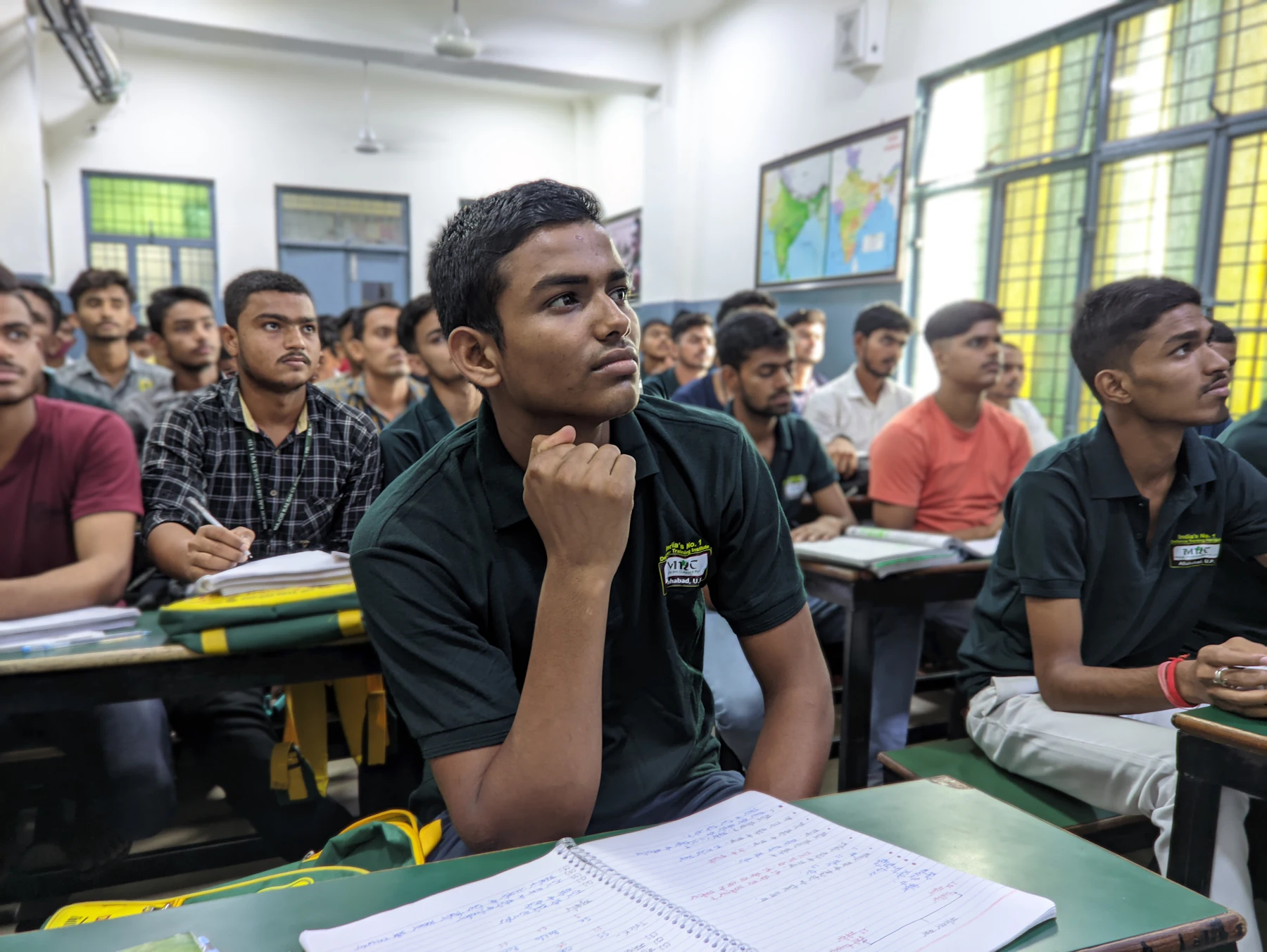 College students listening in a classroom session
